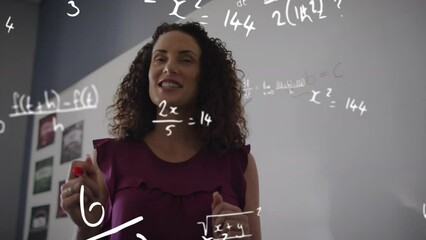 Poster - Animation of maths calculations over smiling biracial female teacher teaching in classroom