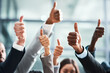 © Jadon Bester/peopleimages.com - Success, thumbs up and teamwork of people with thank you, support or group hands for vote, yes or like emoji. Great, ok and business women, men or winner with team work, thanks or winning sign in air