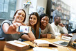 © Jadon Bester/peopleimages.com - Women friends, selfie and college library with smile, happiness or diversity for social media app. Girl, group and happy for photography, profile picture or blog for solidarity, education or support