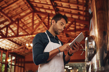 Poster - Tablet, search and brewery with man in factory for production, manufacturing and alcohol fermentation. Technology, inspection and digital with business owner for distillery, beer and quality control