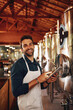 © Stratford/peopleimages.com - Tablet, beer and portrait with man in factory for production, manufacturing and alcohol fermentation. Technology, inspection and digital with business owner for distillery, storage or quality control