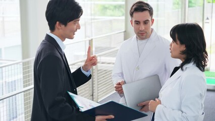 Poster - Group of multinational engineers and business people meeting in a building. Medical Representative