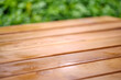 Empty wooden garden table with blurred natural bokeh background. Lacquer.