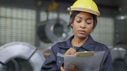 Engineer woman examining and measuring steel at lathe factory, worker or technician check and maintenance metal with professional, industry and machinery concept.