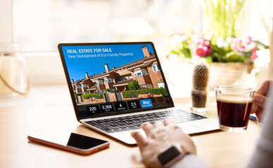 Woman searching online for a new real estate to buy