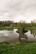 Beautiful Landscape Pond With Wooden Bridge