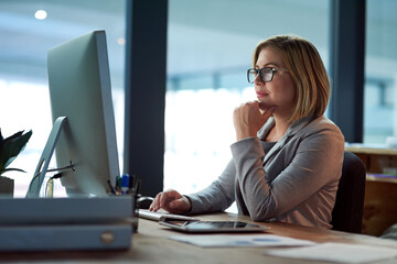 Poster - Computer, thinking and business woman in office working late on project at night alone. Desktop, professional and female person problem solving, focus or solution, planning or reading on deadline
