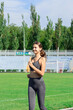 young fitness woman runner running on stadium track. Training in the morning time. People sport and fitness concept