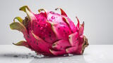 dragon fruit on white background with visible drops of water generative ai