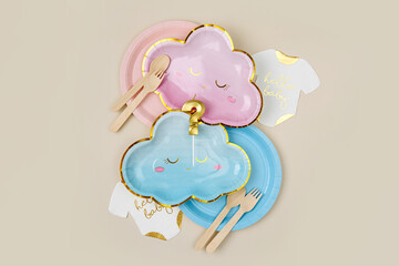 Wall Mural - Cute paper party plates in the shape of clouds in pink and blue colored  for themed party. Baby shower party decorations. Set of holiday disposable tableware for gender party. Boy or girl.