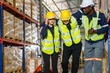 © DG PhotoStock - Male warehouse worker have an accident during working in the storage warehouse and his friends come to help or assist him and taking him to the safety area.