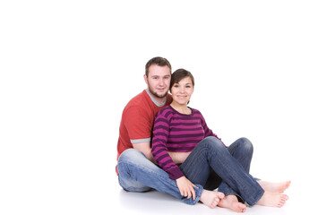 Wall Mural - happy young couple together on white background