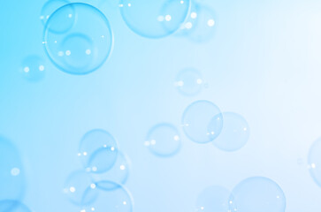 Wall Mural - Beautiful Blurred Transparent Blue Soap Bubbles. Abstract Background. Defocused White Space. Celebration Festive Backdrop. Freshness Soap Suds Bubbles Water	
