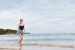 © SHOTPRIME STUDIO - woman lifestyle young running happiness smile beach sunset travel summer sea