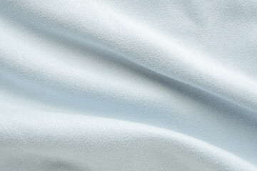 Abstract blue fabric texture with soft wave background