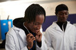 © Connect Images - Medical student using stethoscope in class