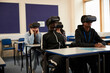 © Connect Images - Students wearing VR headsets in class