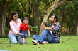 © Karan - Indian Family in the park