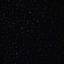 Illustration Of Blue Rain Drops Falling On A Black Background Created With Generative AI Technology