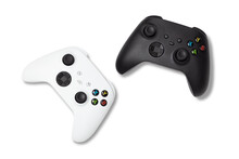 Photo Of Used White And Black Gamepads Console Controllers Isolated Over A Transparent Background, Gaming Design Elements, Flat Lay / Top View With Subtle Shadow