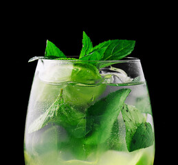 Fresh mojito in wine glasses on stone