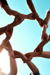 Poster - Hands, link and circle with teamwork and blue sky with low angle, solidarity and trust with arm chain and people together. Team, motivation and connection with group collaboration and community