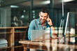 © Jadon B/peopleimages.com - Happy business man, phone call and laptop in office for conversation, communication and contact for planning. Male worker talking on cellphone at computer for mobile networking, consulting and hello