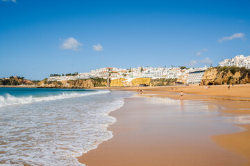 Wall Mural - Great view of Fisherman Beach, Praia dos Pescadores, with whitewashed houses on cliff, Albufeira, Algarve, Portugal