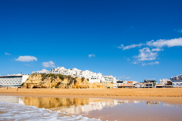 Canvas Print - Great view of Fisherman Beach, Praia dos Pescadores, with whitewashed houses on cliff, Albufeira, Algarve, Portugal