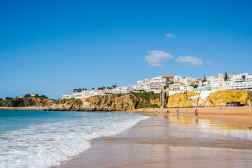 Wall Mural - Great view of Fisherman Beach, Praia dos Pescadores, with whitewashed houses on cliff, Albufeira, Algarve, Portugal