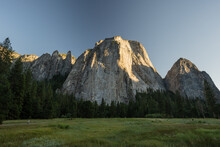 Cathedral Rocks Catch Morning Light Over El Capitan Meadow
