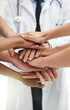 © Diane M/peopleimages.com - Teamwork, motivation and support with hands of doctors for medical, collaboration and solidarity. Medicine, healthcare and expert with closeup of people in meeting for target, goals and mindset