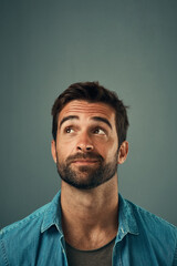 Aufkleber - Man, face and thinking on mockup space for idea, plan or wondering against a grey studio background. Isolated thoughtful male person or model in question, doubt or confused mindset for planning dream