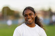 © Austockphoto - head and shoulders of aboriginal girl looking straight on and wearing white t-shirt