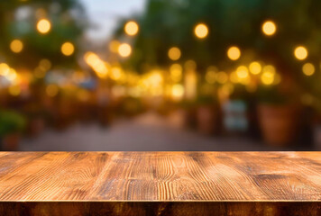 Leinwandbilder - Empty wooden table and blurred background of night market. For product display