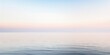 Horizon Line Dividing a Calm Sea and a Pastel Sky - AI Generated