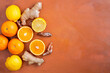 © Anna - orange, lemon, ginger and turmeric on an orange background