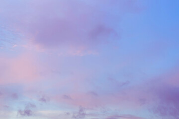 Wall Mural - twilight sky with effect of light in pastel pink, coral, orange, blue tones. colorful sunset of soft