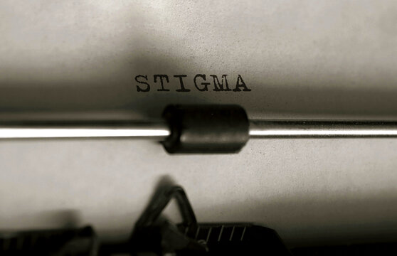 Text stigma typed on retro typewriter