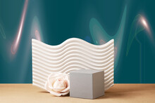 Still Life. Abstract 3D Composition For Advertising Cosmetic Products. Gray Cubic Podium And A Beautiful Cream Rose On A Dark Blue Green Background