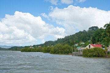 Sticker - Mangrove edged Hokianga Harbour and bush clad background at  Kohukohu