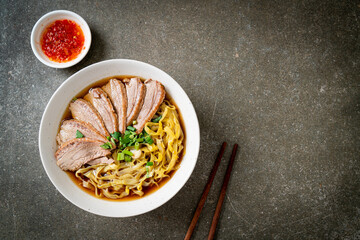 egg noodles with stewed duck in brown soup