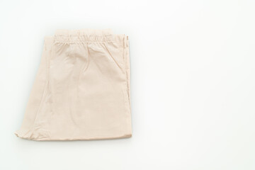 Sticker - beige pant fold on white background