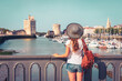 Woman tourist visiting La Rochelle city- Charente Maritime in France