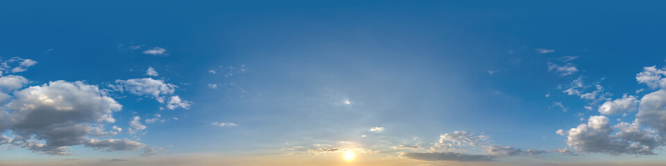 Wall Mural - 360 hdri panorama of sunset skydome with evening clouds in seamless spherical equirectangular format