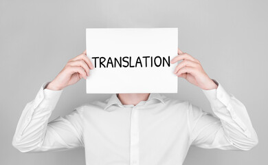 Poster - Man covers his face with white paper with text translation