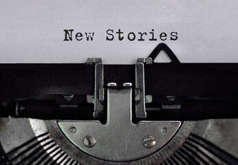 Aufkleber - Text new stories typed on retro typewriter