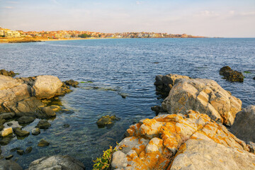 Wall Mural - rocky coastline in the morning. bulgarian shore of the black sea on the calm morning