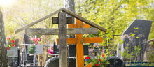 Old Wooden Crosses In The Cemetery