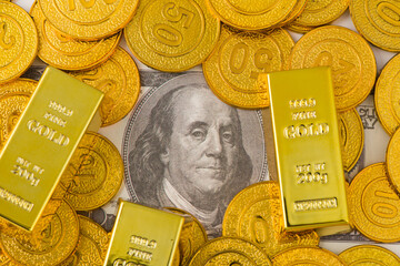 Wall Mural - gold bars, gold coins and dollar background.